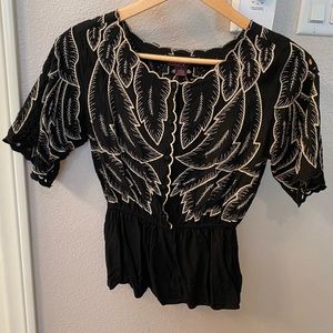 Maple black embroidered top in size 2. Buttons and fitted at waist.
